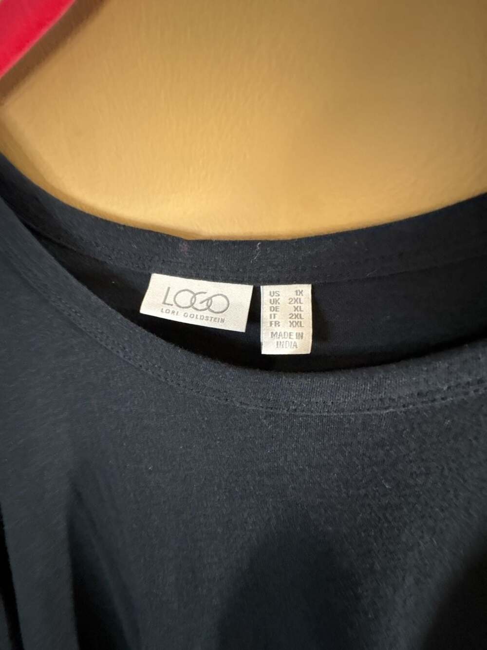 HC1076. LOGO by Lori Goldstein Black Long Sleeve Tunic Top with Ruffled Hem, 1X
